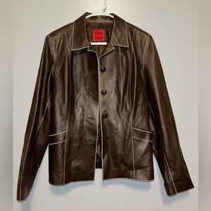 Beautiful, new, never worn, brown leather jacket with small pockets.